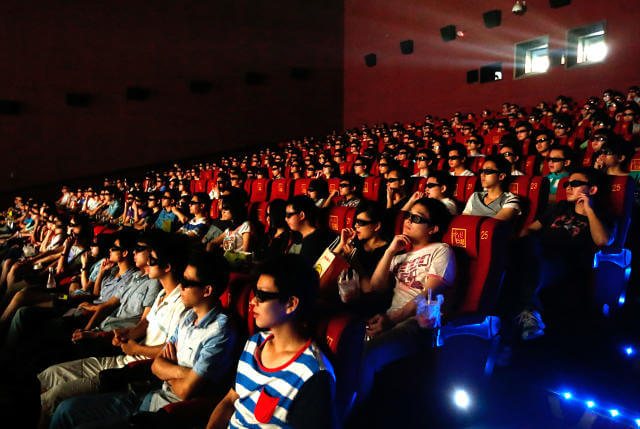 image of seeing movie in Theatre